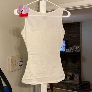 Sleek and sexy tank white/cream color very soft and slimming